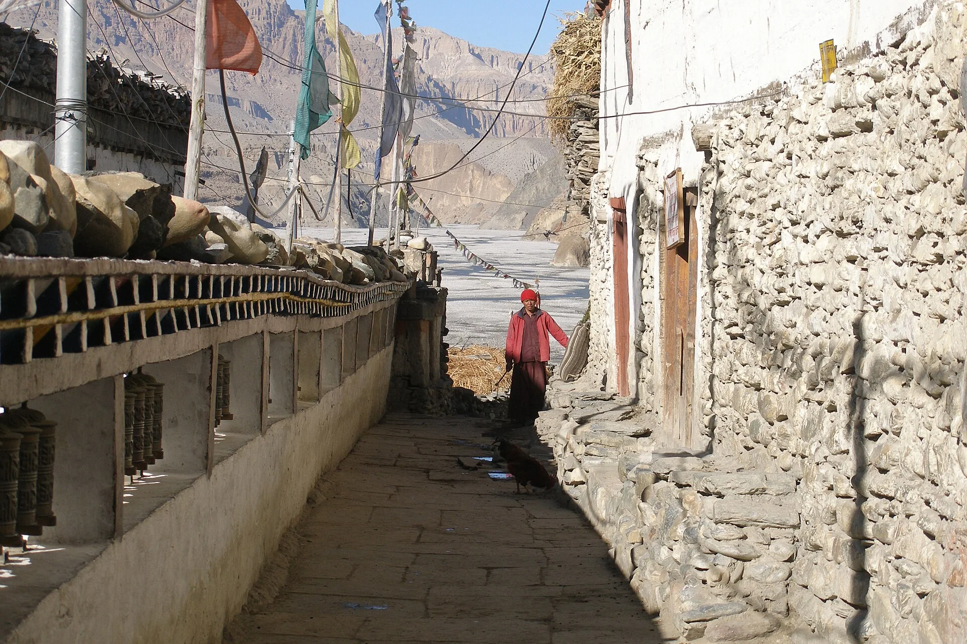 Stone and earthen buildings in a lane in Kagbeni, Mustang